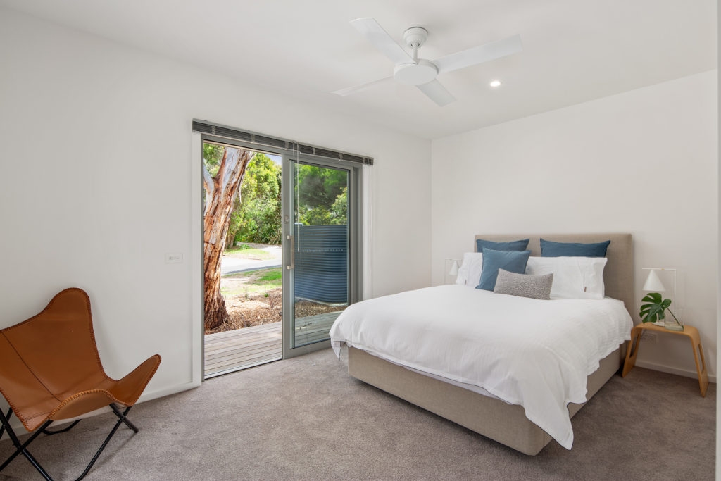 Ecoliv Heyland project featuring bedroom with full length sliding door